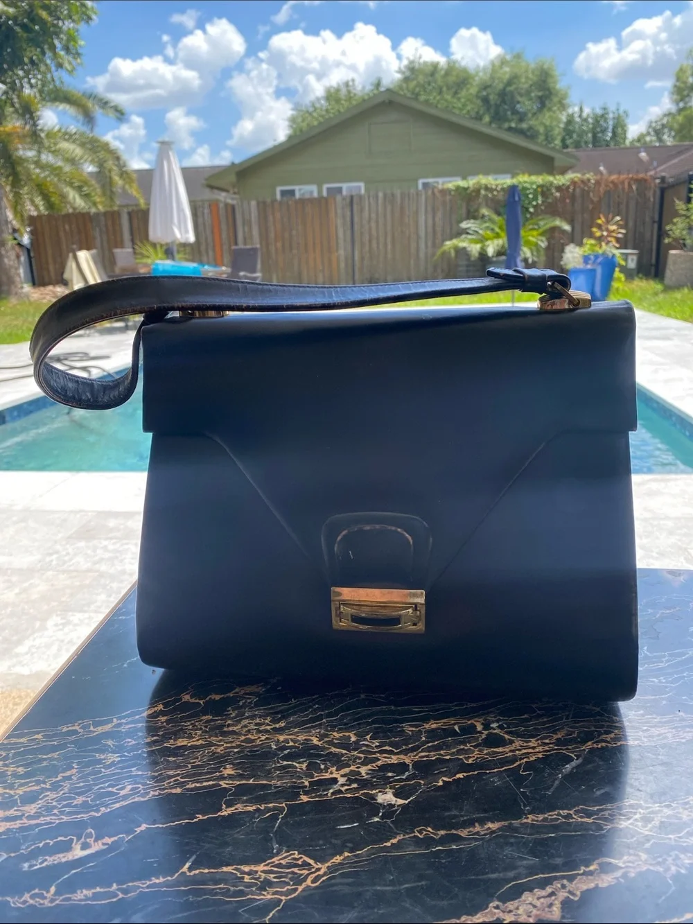Classic Black Leather Shoulder Bag with Gold Tone Hardware
